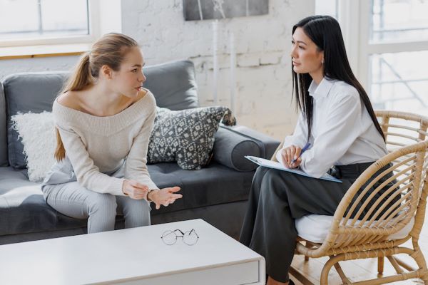 female speaking to a female psychologist