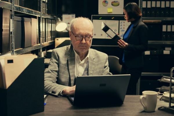 forensic psychologist looking at computer