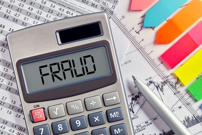 calculator displaying fraud in number field