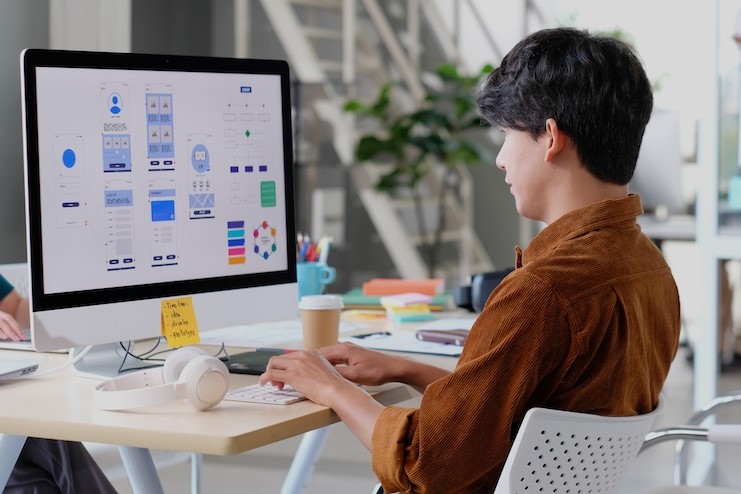 mobile app designer on computer