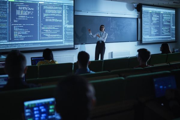 master's in cybersecurity professor presenting to class