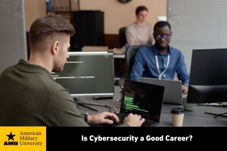 is-cybersecurity-a-good-career cybersecurity professionals working on laptops