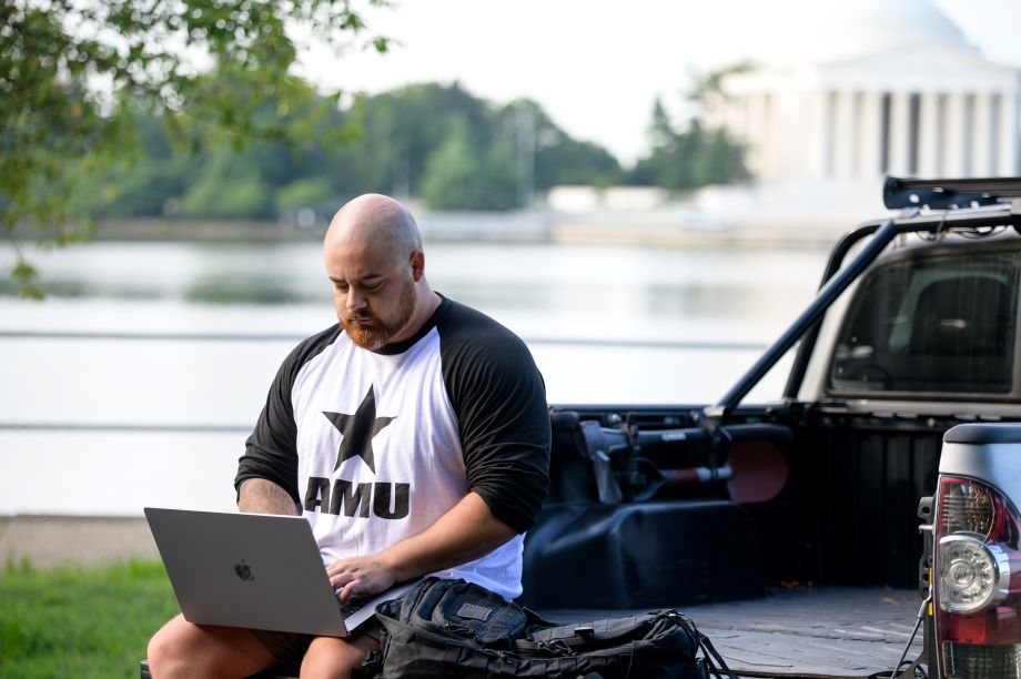 military student on laptop
